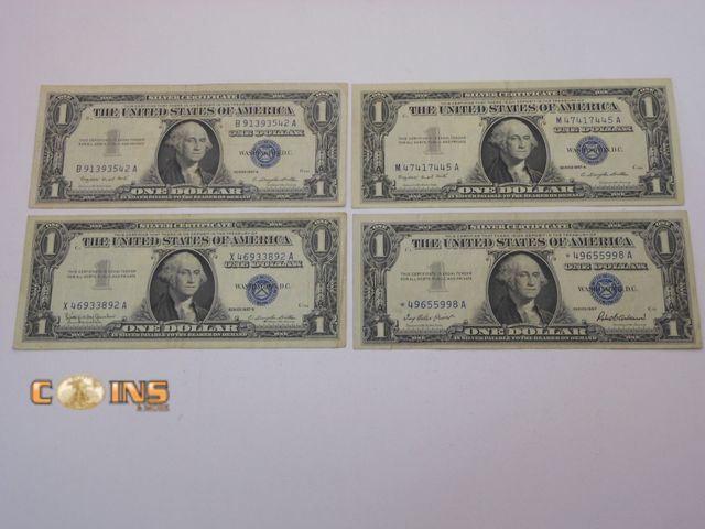 Lot 36-487767 - Lot of Four Better Condition Blue Seal Silver Certificates With Star Note.