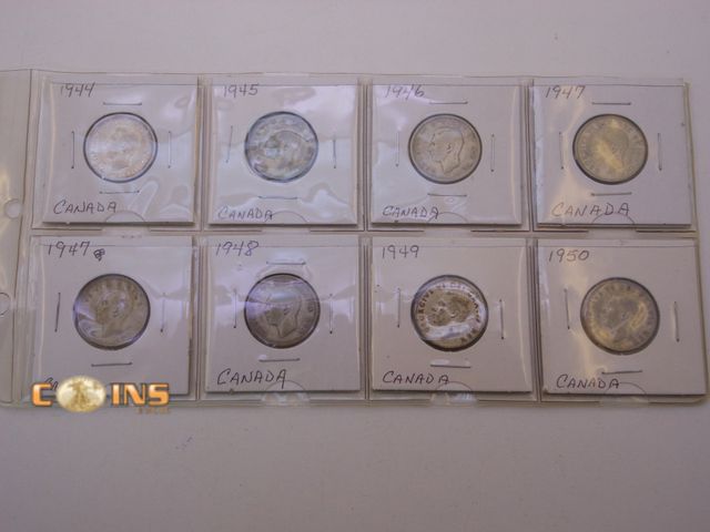 Lot 36-486630 - Lot of Eight Silver Canadian Quarters, Carded.