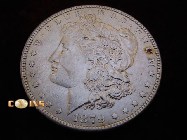 Lot 36-086645 - AU 1879 Morgan Silver Dollar.