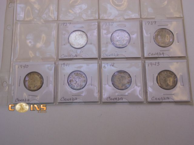 Lot 36-486629 - Lot of Seven Silver Canadian Quarters, Carded.