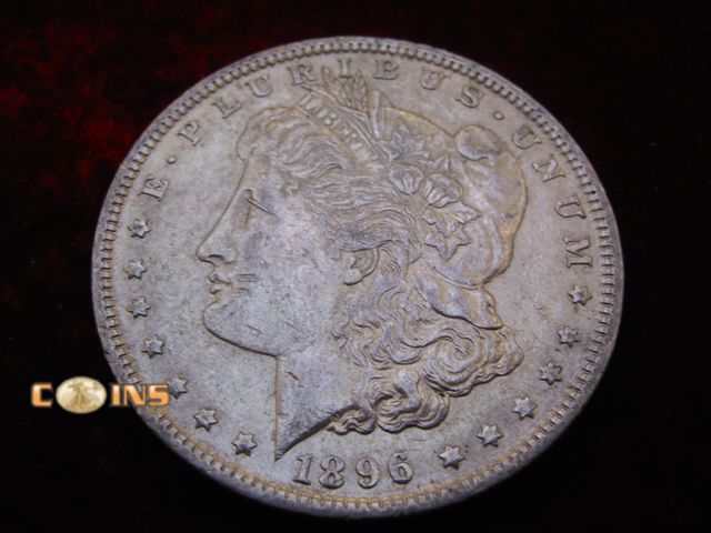 Lot 36-486396 - AU 1896 Morgan Silver Dollar.