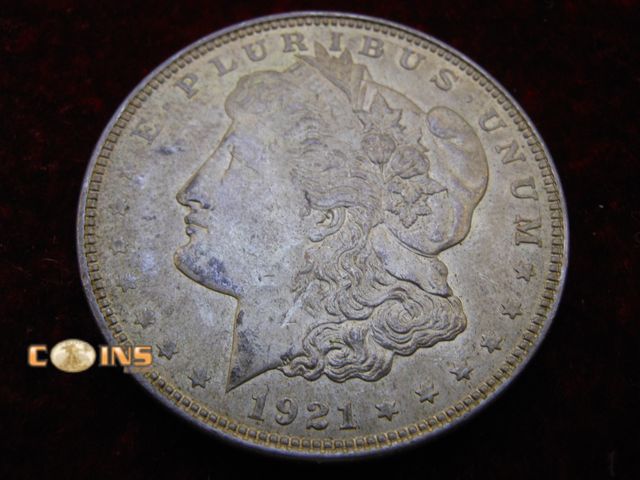 Lot 36-086712 - 1921 Morgan Silver Dollar.
