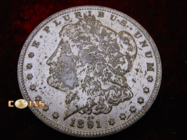 Lot 36-087104 - 1891-O Morgan Silver Dollar.