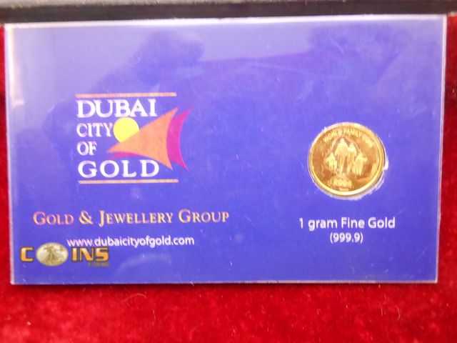 Lot 36-487736 - One Gram .9999 Fine Gold Round, Comes in Credit Card Sized COA.