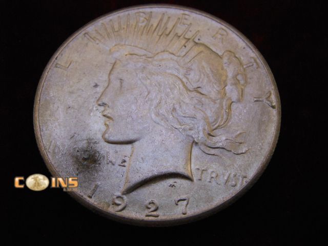Lot 36-487303 - 1927 Silver Peace Dollar.