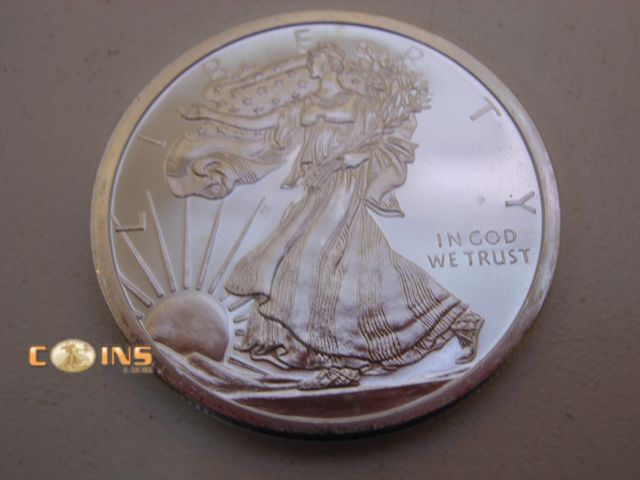 Lot 36-486560 - .999 Fine Silver One Troy Ounce Walking Liberty Designed Round.