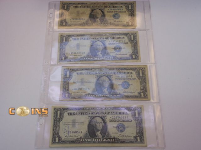 Lot 36-487915 - Lot of Four Star Notes Blue Seal Silver Certificates in Three Ring Binder Sheet.