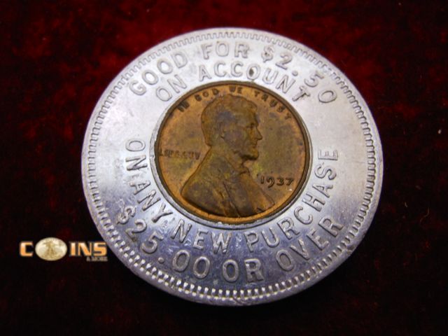 Lot 36-086800 - UNC 1937 Wheat Cent Encapsulated in "Keep Me and Never Go Broke" Round.