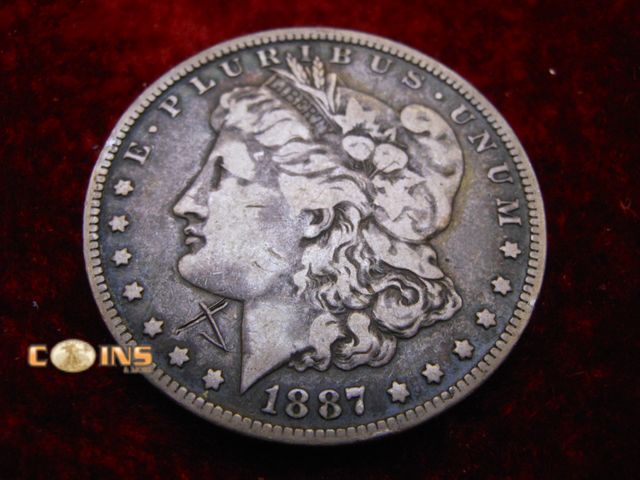Lot 36-086720 - 1887-O Morgan Silver Dollar.