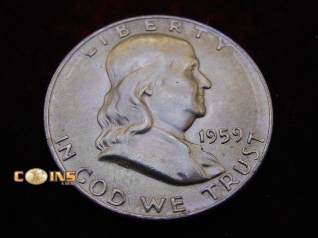 Lot 36-486499 - AU/BU 1959-D Silver Franklin Half Dollar. Full Bell Lines Visible.