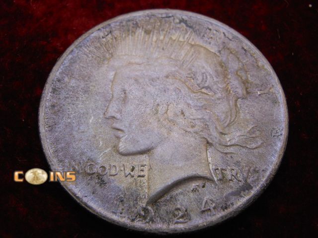 Lot 36-486673 - 1924 Silver Peace Dollar.