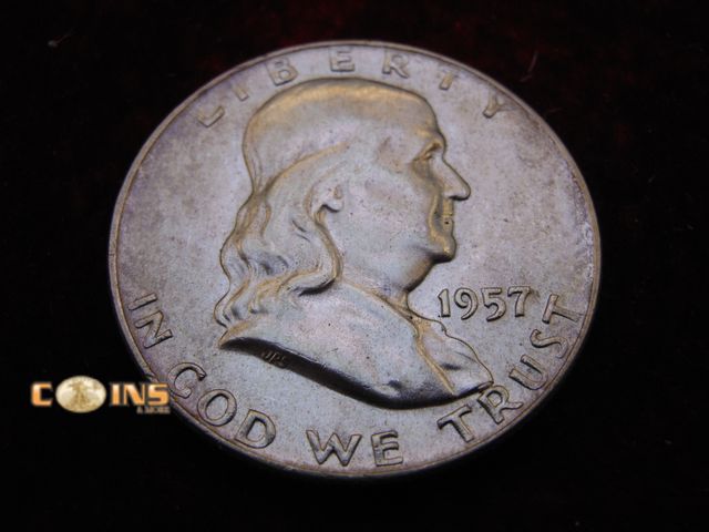 Lot 36-486495 - AU 1957-D Silver Franklin Half Dollar. Bell Lines Visible.