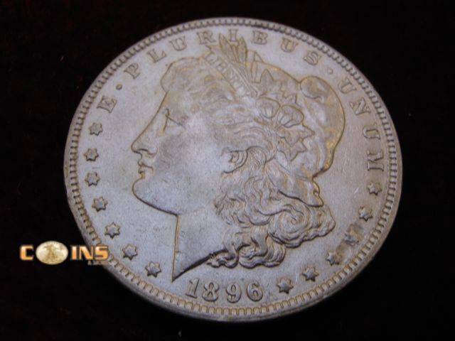 Lot 36-486402 - AU+ 1896 Morgan Silver Dollar.  Full Breast Feathers.