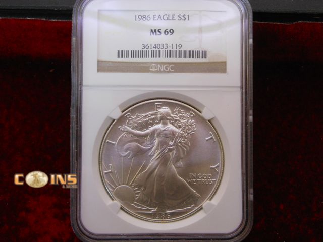Lot 36-487757 - 1986 NGC Graded MS69 Silver American Eagle.  .999 Fine Silver One Troy Ounce Round.