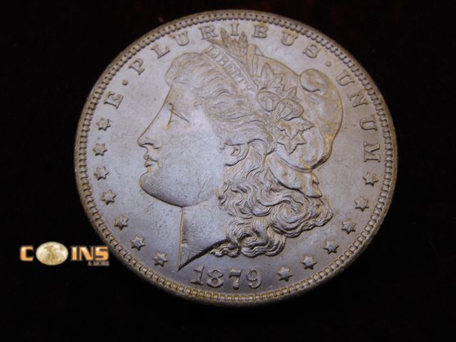 Lot 36-238229 - AU/UNC 1879 Morgan Silver Dollar, Full Breast Feathers.