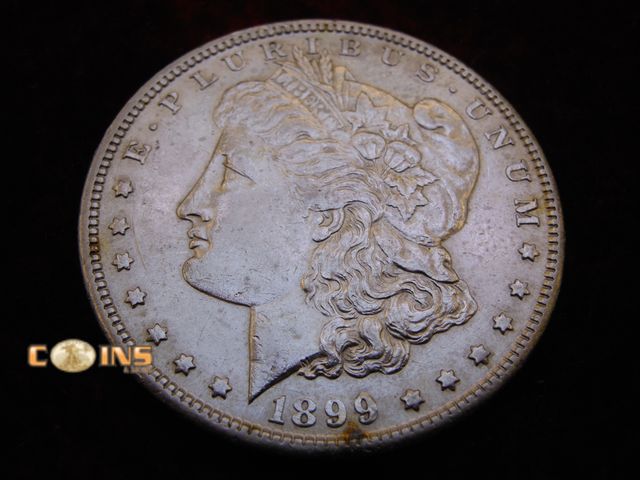 Lot 36-086652 - HARD TO FIND IN THIS CONDITION 1899-S Morgan Silver Dollar.
