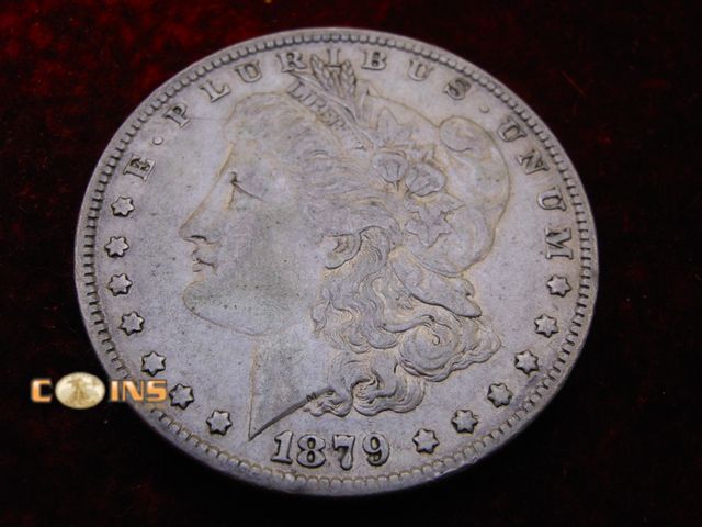 Lot 36-486390 - 1879 Morgan Silver Dollar.
