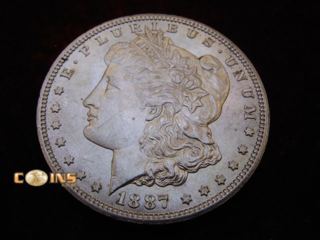Lot 36-087095 - AU/BU 1887-S Morgan Silver Dollar.