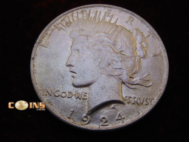 Lot 36-238200 - Better Condition 1924 Silver Peace Dollar.