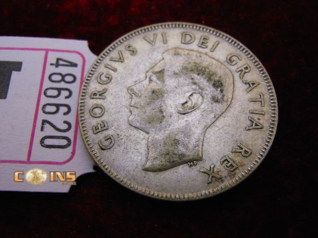 Lot 36-486620 - 1952 Canadian Silver Half Dollar.