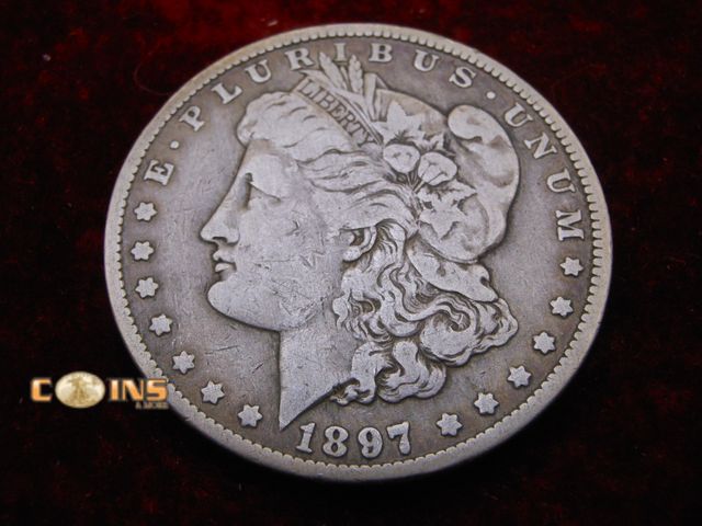 Lot 36-238163 - Better Date 1897-O Morgan Silver Dollar.