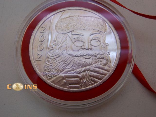 Lot 36-486723 - .999 Fine Silver One Troy Ounce 2002 Merry Christmas Round, Comes in Box.