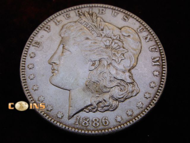 Lot 36-486213 - 1886 Morgan Silver Dollar.