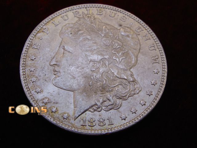 Lot 36-487277 - AU+ 1881 Morgan Silver Dollar.