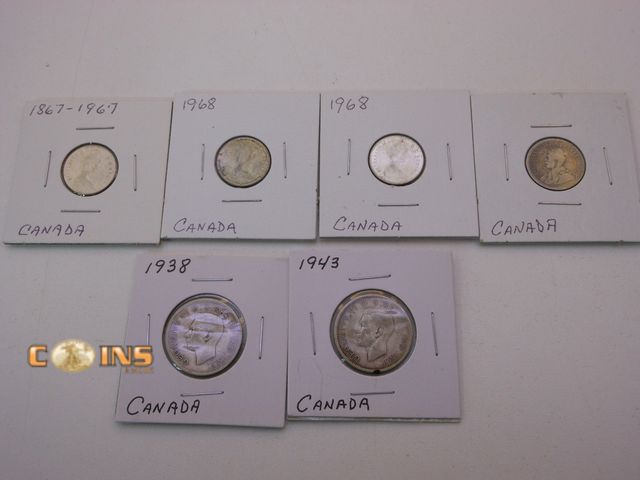 Lot 36-486626 - Lot of Two Silver Canadian Quarters and Four Silver Canadian Dimes.  Carded.