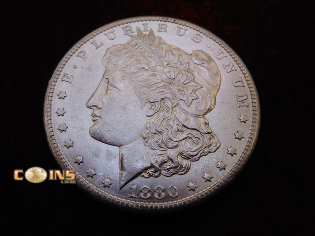 Lot 36-487798 - UNC/BU 1880-S Morgan Silver Dollar.  Fantastic Eye Appeal.