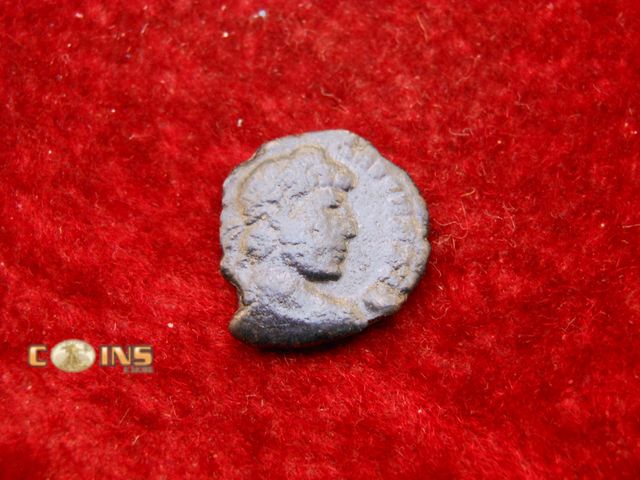 Lot 36-086586 - Ancient TO BE IDENTIFIED...AE FOLLIS...REVERSE...Victory left Walking.
