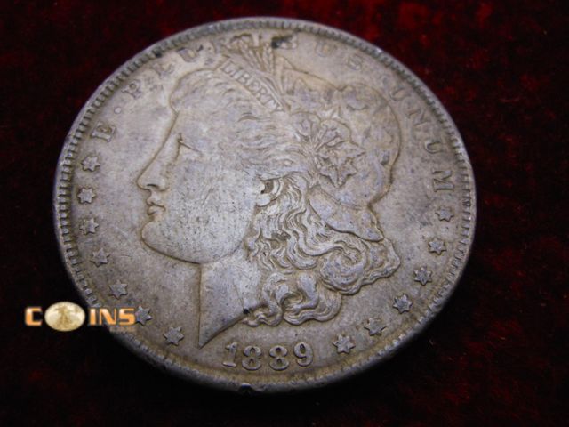 Lot 36-086717 - 1889 Morgan Silver Dollar.