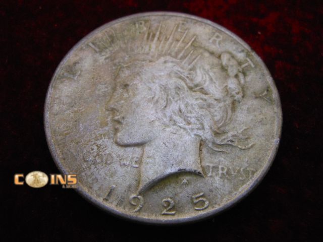 Lot 36-087158 - 1925 Silver Peace Dollar.