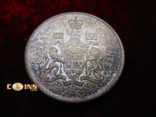 Lot 36-487922 - 1964 Silver Canadian Half Dollar.