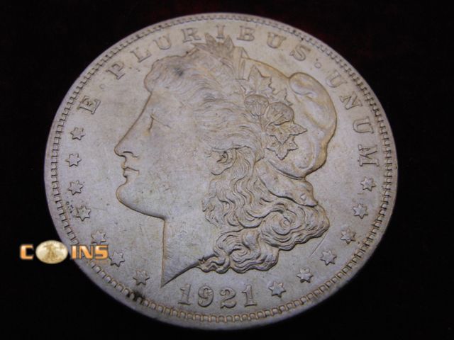 Lot 36-486404 - AU/BU 1921 Morgan Silver Dollar.  Full Breast Feathers.