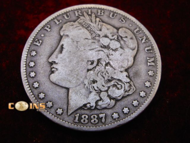 Lot 36-087094 - 1887-O Morgan Silver Dollar.
