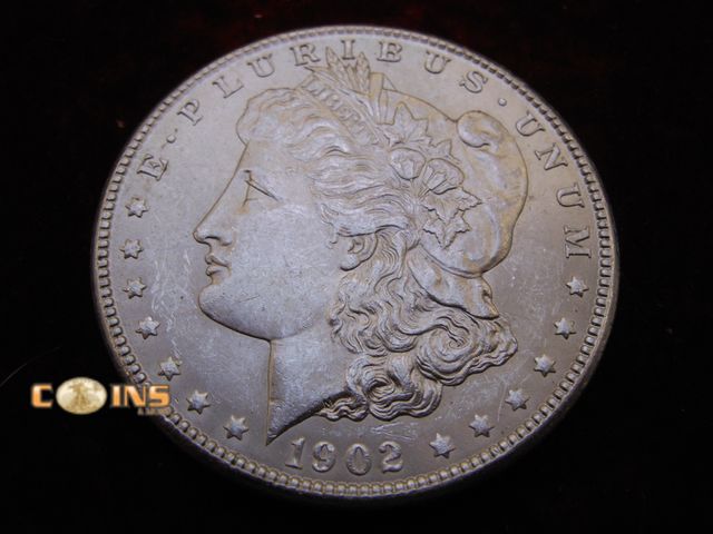 Lot 36-238228 - AU/UNC 1902-O Morgan Silver Dollar, Full Breast Feathers.