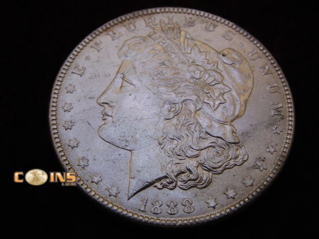 Lot 36-489119 - AU 1888 Morgan Silver Dollar.