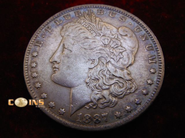 Lot 36-487983 - 1887-O Morgan Silver Dollar.