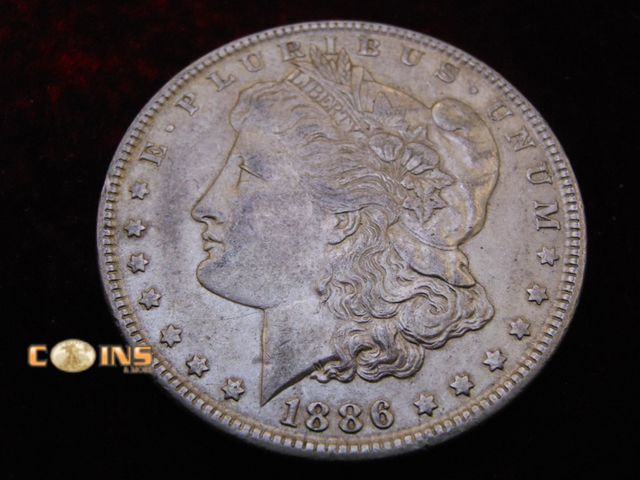 Lot 36-486387 - 1886 Morgan Silver Dollar.