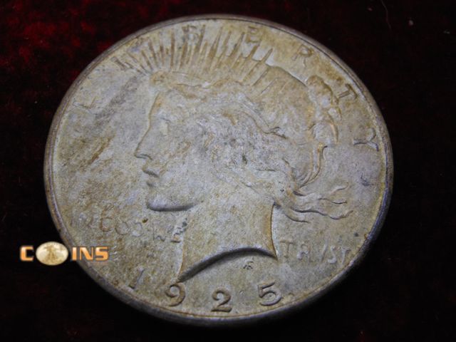 Lot 36-486674 - 1925 Silver Peace Dollar.