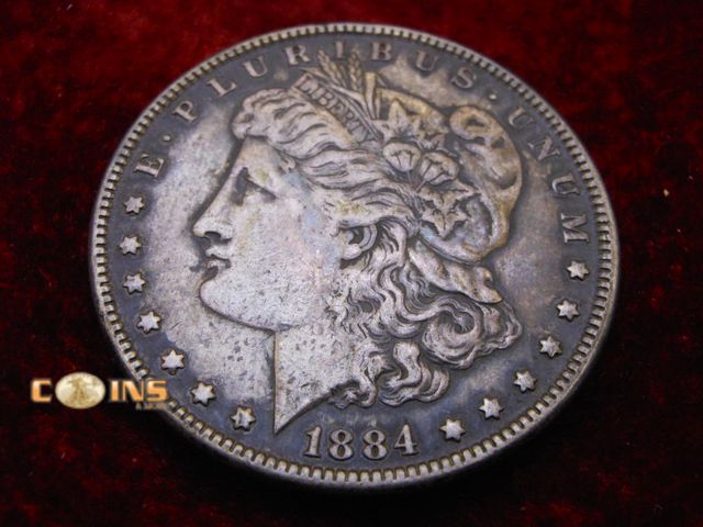 Lot 36-486400 - 1884 Morgan Silver Dollar.