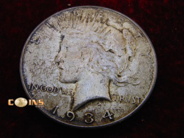 Lot 36-087160 - 1934-D Silver Peace Dollar.