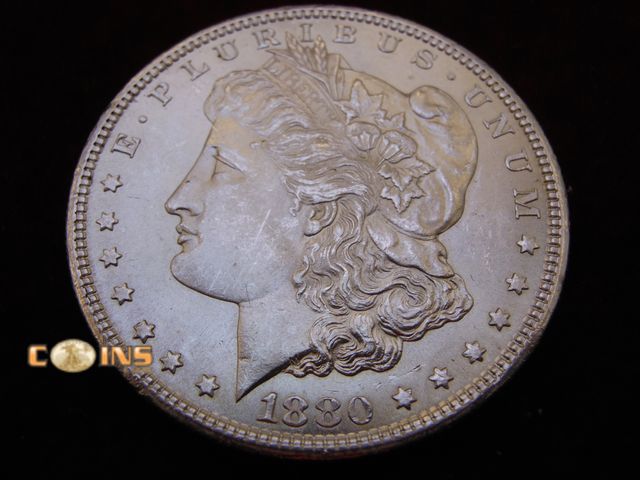 Lot 36-487275 - UNC/BU 1880-S Morgan Silver Dollar.