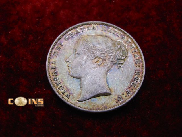 Lot 36-487860 - AU+++ Great Britain 1859 Silver British One Shilling.