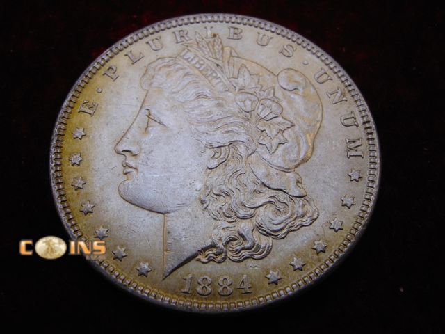 Lot 36-087118 - AU++ 1884 Morgan Silver Dollar.
