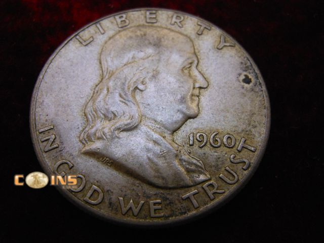 Lot 36-087165 - 1960 Silver Franklin Half Dollar.