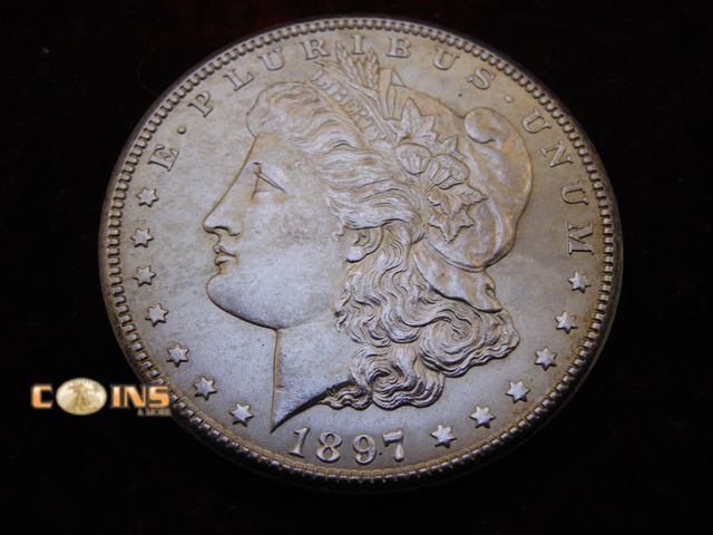 Lot 36-238164 - AU+ 1897-S Morgan Silver Dollar.