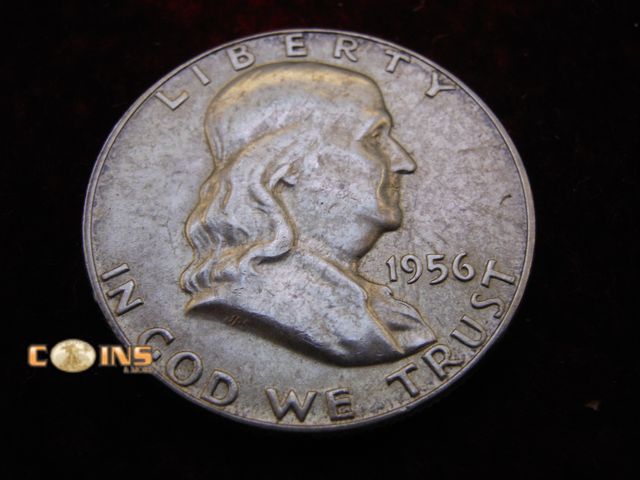 Lot 36-486494 - AU 1956 Silver Franklin Half Dollar. Full Bell Lines Visible.