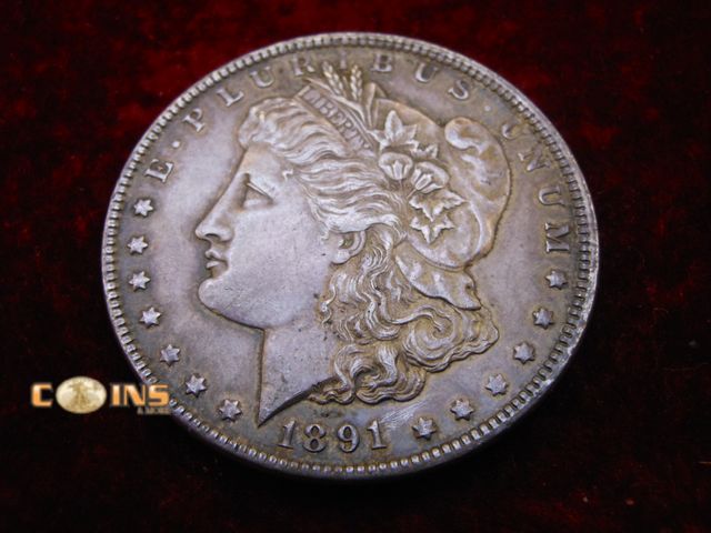 Lot 36-087103 - 1891 Morgan Silver Dollar.